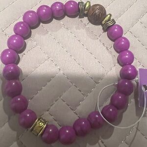 Vibrant Purple Bracelet with Gold Accents